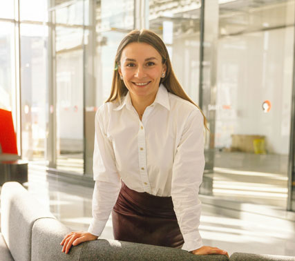 Focused student working on a laptop