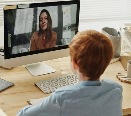 Focused student working on a laptop