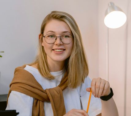 Focused student working on a laptop
