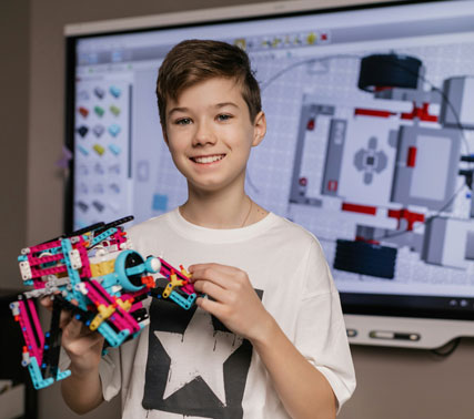 Focused student working on a laptop